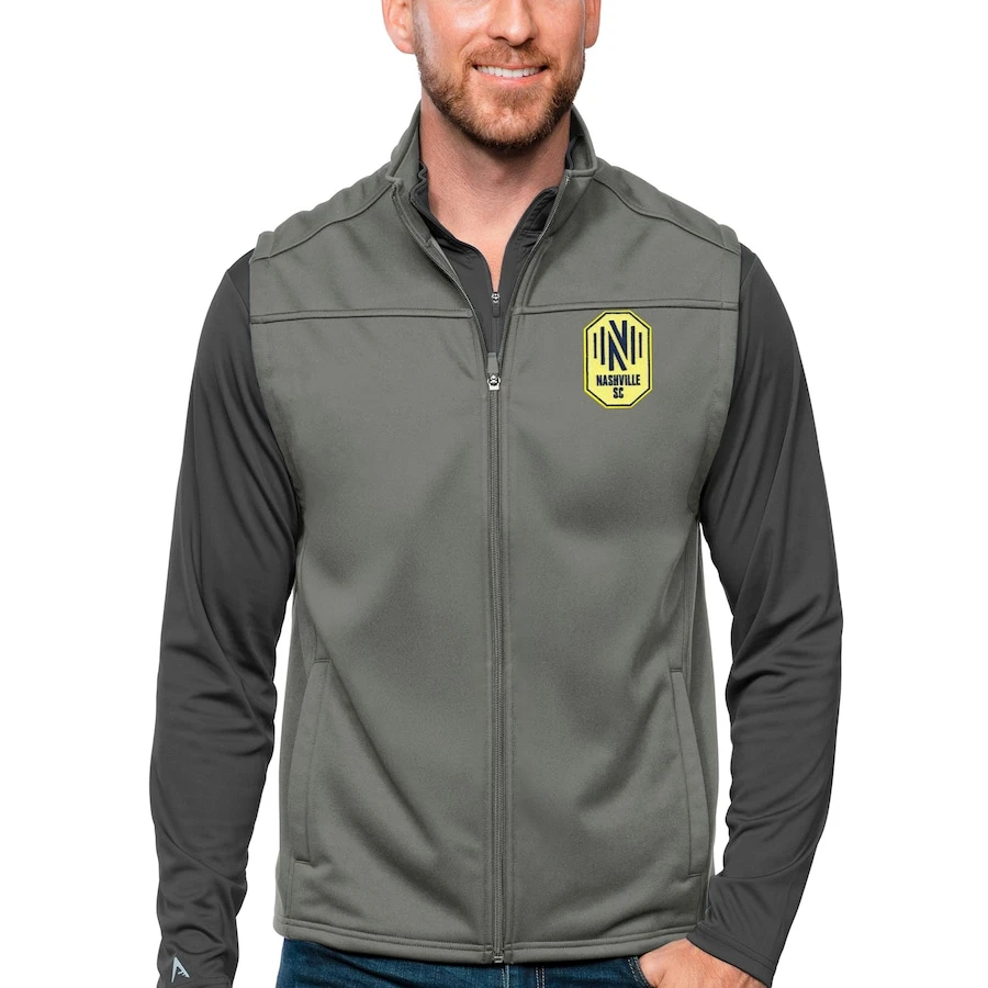 Nashville SC Antigua Primary Team Logo Links Full-Zip Golf Vest - Steel 1 Nashville SC Antigua Primary Team Logo Links Full-Zip Golf Vest - Steel